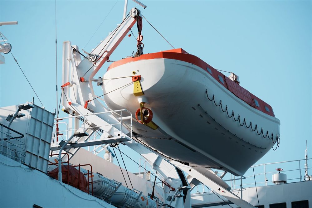 Lifeboat secured on its davit on a passenger ship